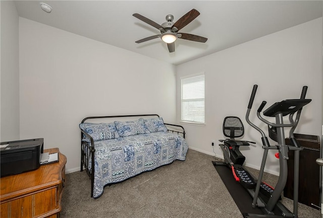 bedroom with ceiling fan and dark colored carpet