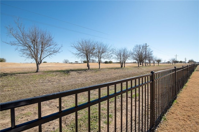 view of yard with a rural view