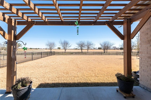 view of yard featuring a rural view and a pergola