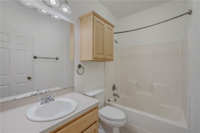 full bath featuring vanity, toilet, and shower / bathtub combination