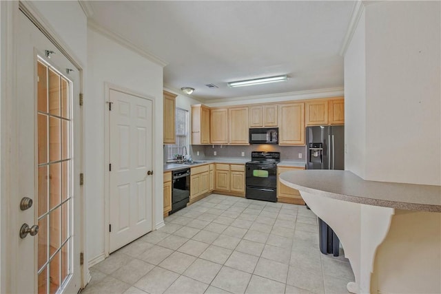 kitchen featuring decorative backsplash, light countertops, crown molding, black appliances, and light brown cabinets