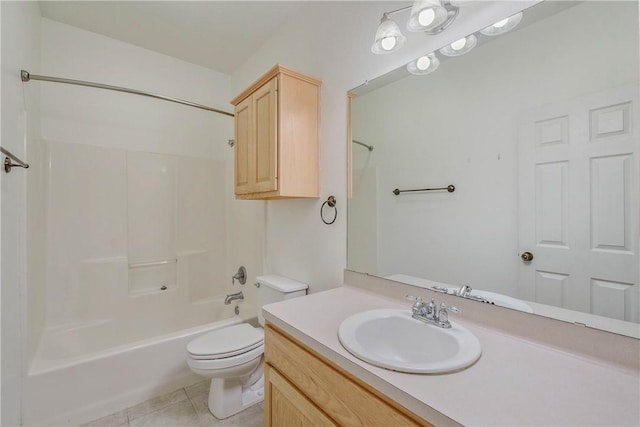 full bathroom featuring toilet, bathtub / shower combination, vanity, and tile patterned floors