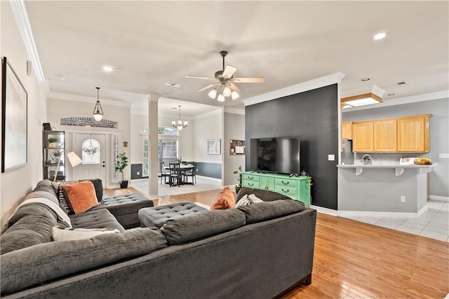 4906 Park Row Pl, Bryan, TX 77802 - living area with a ceiling fan, decorative columns, ornamental molding, a chandelier, and recessed lighting