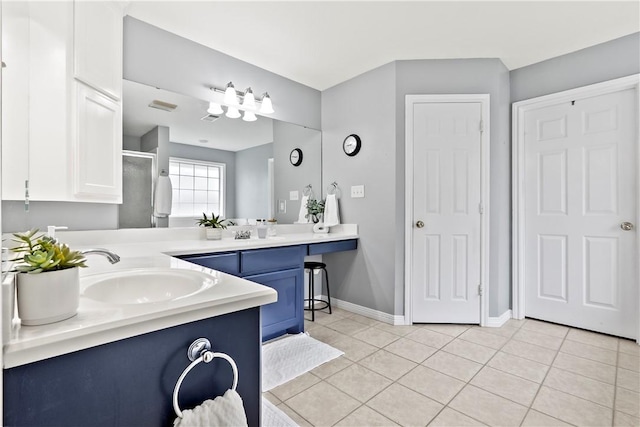 4906 Park Row Pl, Bryan, TX 77802 - bathroom with vanity, tile patterned flooring, and a stall shower