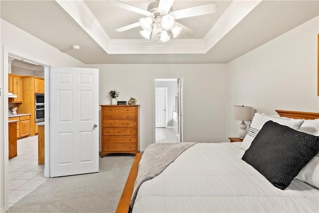 4906 Park Row Pl, Bryan, TX 77802 - bedroom featuring a tray ceiling, ornamental molding, light colored carpet, and ceiling fan