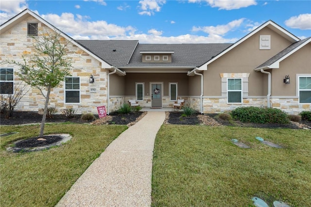 view of front facade with a front yard