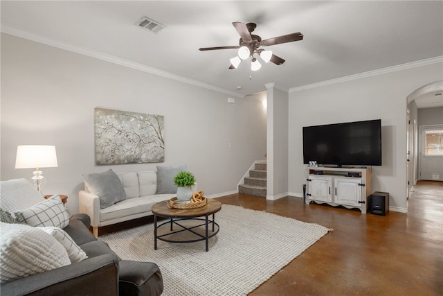 living room featuring crown molding and ceiling fan