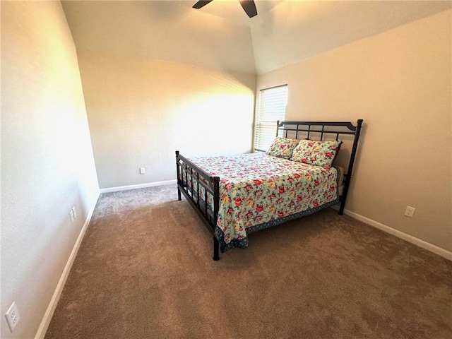 bedroom featuring ceiling fan, carpet floors, and vaulted ceiling