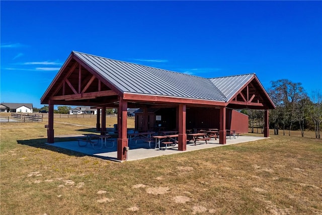 surrounding community featuring a gazebo and a yard