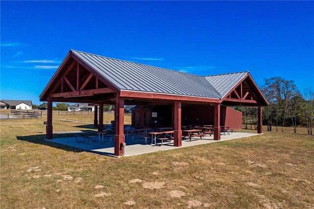 10120 Henley Cv, Iola, TX 77861 - view of property's community with a patio area and a gazebo