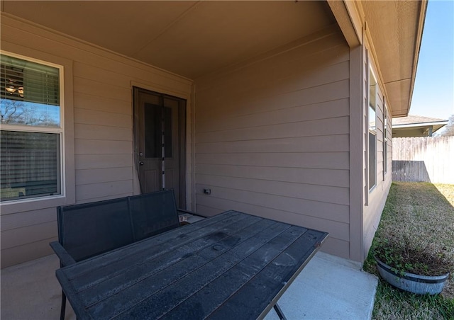 view of patio / terrace featuring fence