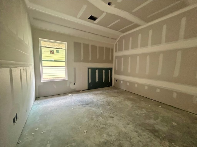 3545 Pointe Du Hoc Dr, Bryan, TX 77808 - unfurnished living room featuring concrete floors