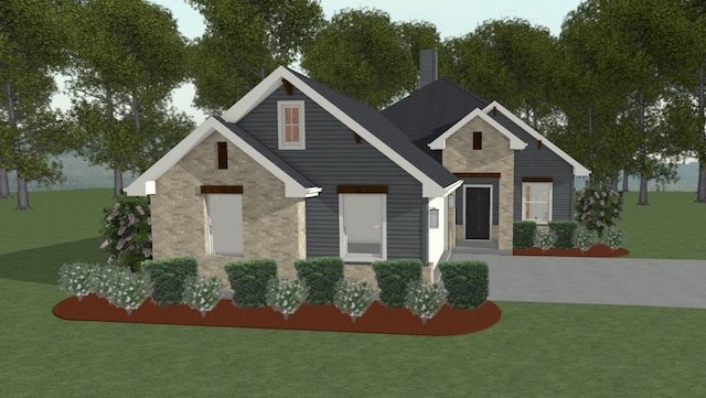 3545 Pointe Du Hoc Dr, Bryan, TX 77808 - view of front of property with a chimney, a front yard, and brick siding