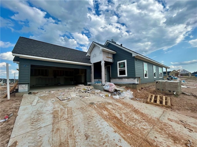 3545 Pointe Du Hoc Dr, Bryan, TX 77808 - unfinished property featuring a garage and concrete driveway