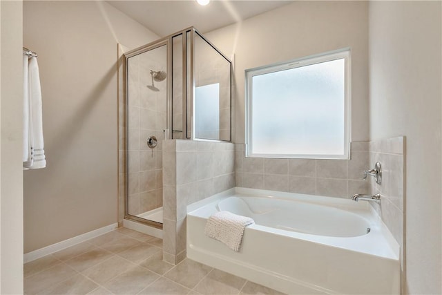 5324 Lyle Pl, Bryan, TX 77807 - bathroom with a bath, a stall shower, and tile patterned floors