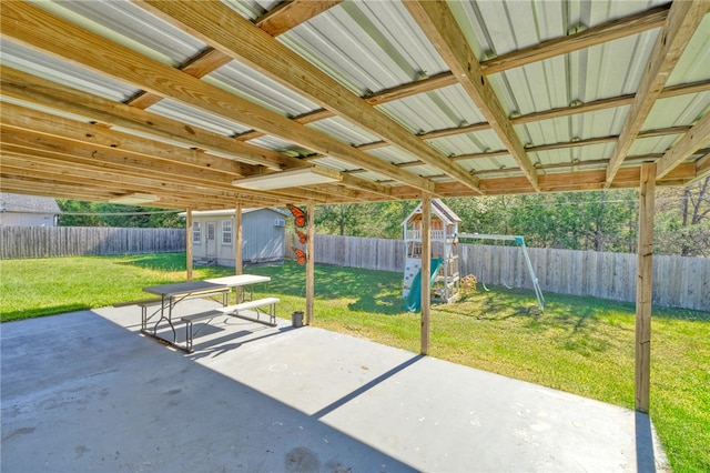 view of patio with an outdoor structure