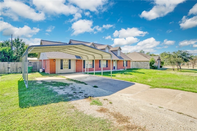 view of front of property featuring a carport and a front lawn