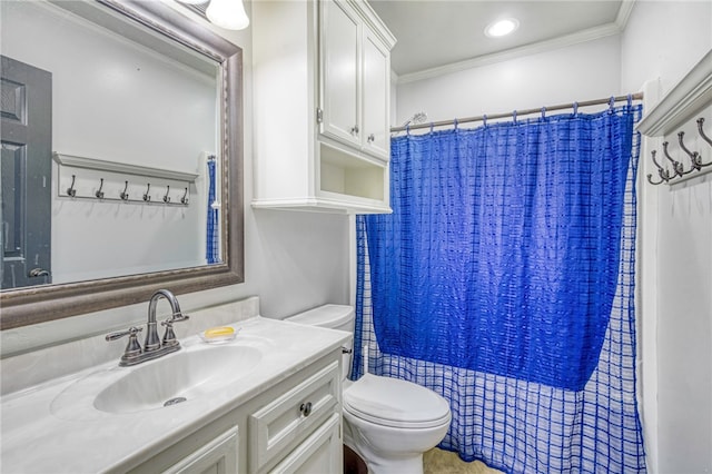 bathroom with crown molding, vanity, a shower with shower curtain, and toilet