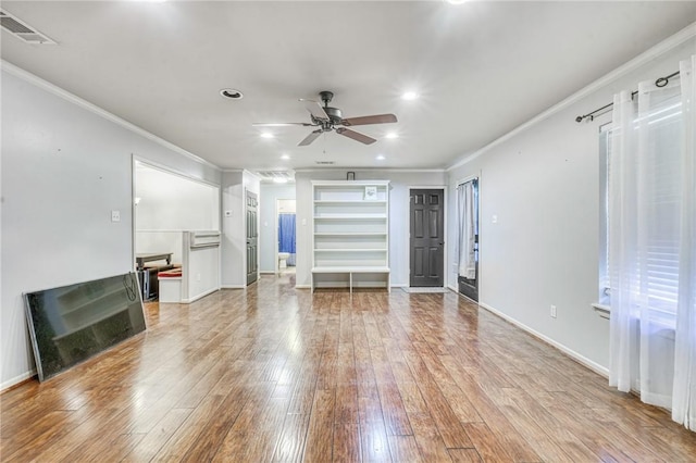 unfurnished living room with ceiling fan, ornamental molding, and light hardwood / wood-style flooring