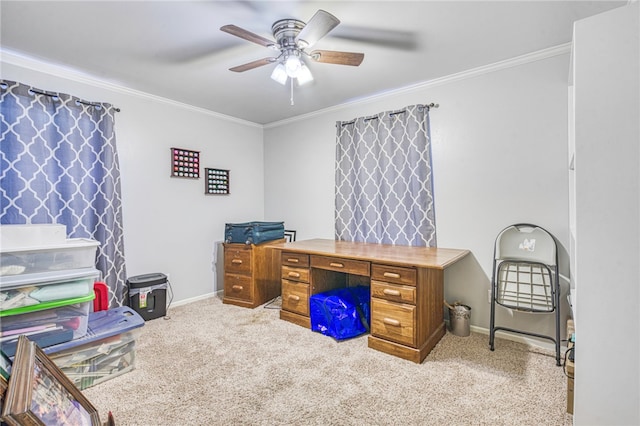 office area with crown molding, ceiling fan, and light carpet