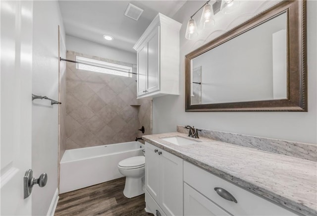3566 Leesburg Path, Bryan, TX 77808 - full bath featuring vanity, toilet, wood finished floors, shower / tub combination, and recessed lighting