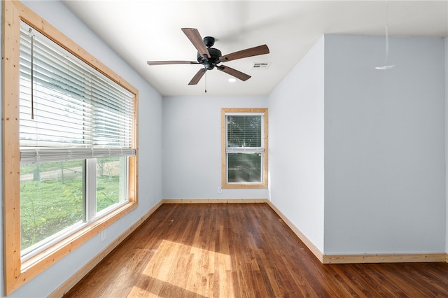 unfurnished room featuring ceiling fan and hardwood / wood-style floors