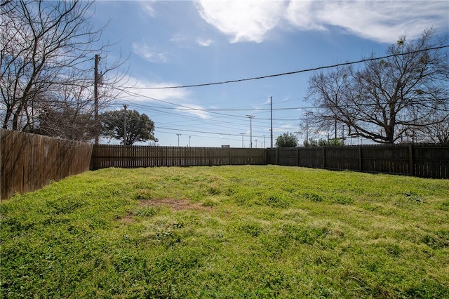 view of yard featuring a fenced backyard