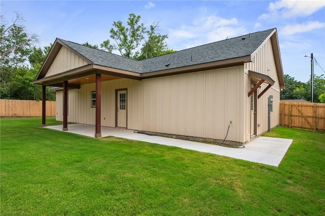 1410 Rochester St, Bryan, TX 77803 - back of house with a patio area, roof with shingles, and a fenced backyard