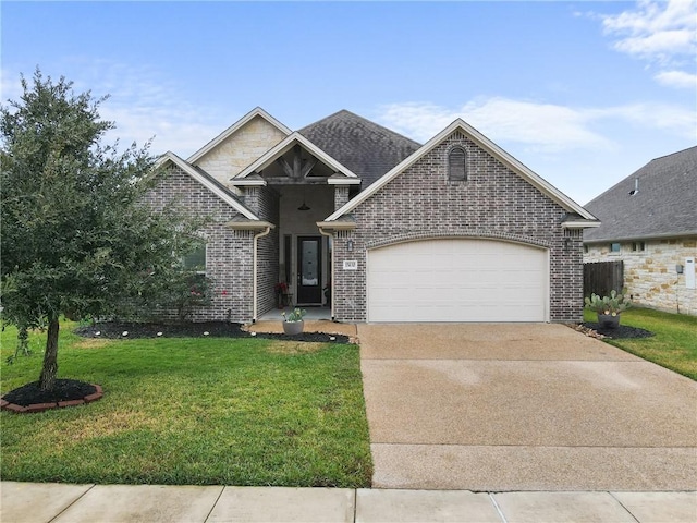 view of front of home featuring a garage and a front lawn