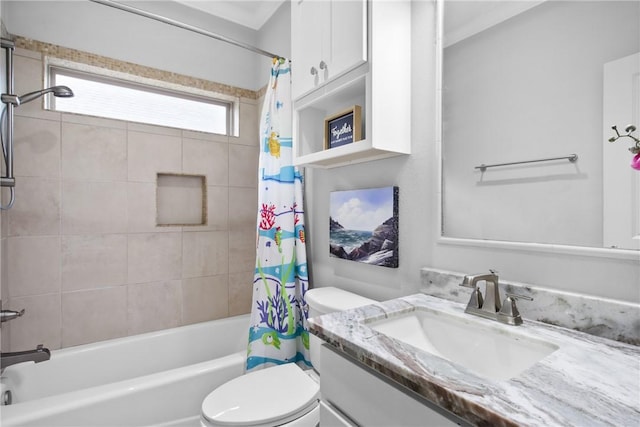 full bathroom featuring vanity, toilet, and shower / bathtub combination with curtain