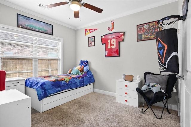 bedroom with ceiling fan, crown molding, and light carpet