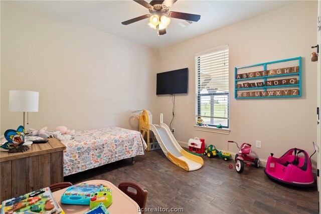 bedroom with ceiling fan and dark wood-type flooring