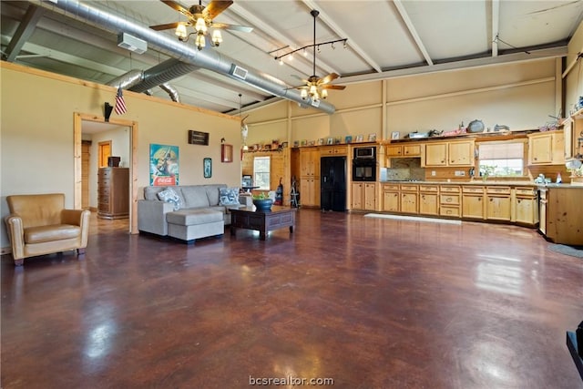 living room with a towering ceiling