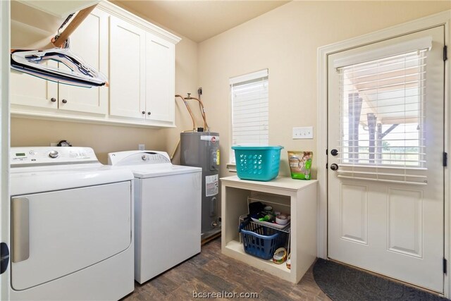 laundry room featuring separate washer and dryer, electric water heater, cabinets, and dark wood-type flooring