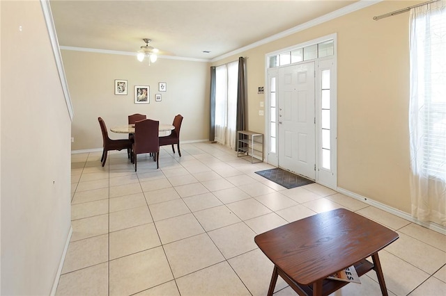 tiled foyer with ornamental molding