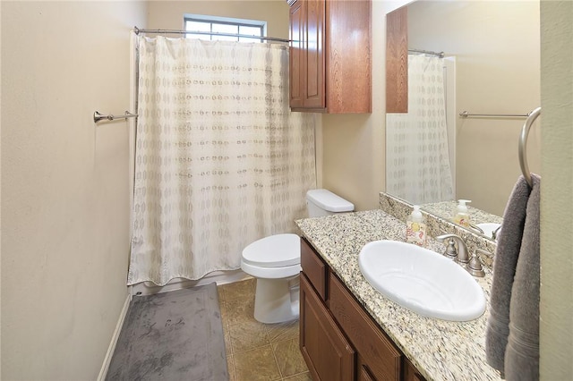 bathroom with tile patterned floors, toilet, vanity, and a shower with curtain