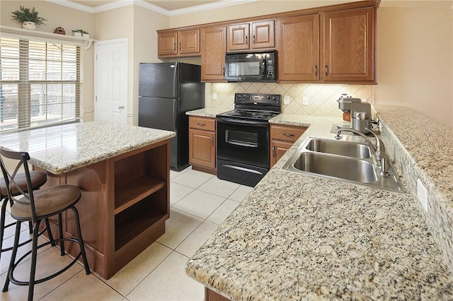 kitchen featuring black appliances, decorative backsplash, light tile patterned flooring, crown molding, and sink