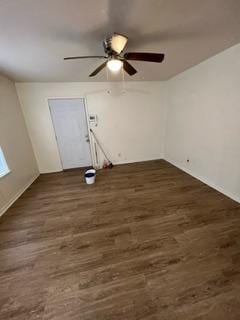 washroom with ceiling fan and dark hardwood / wood-style flooring