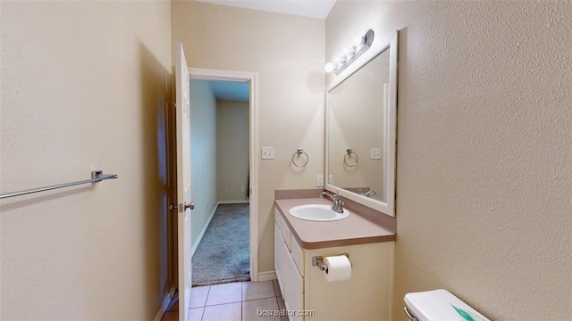 609 Townplace Dr, College Station, TX 77840 - half bathroom with vanity and tile patterned flooring