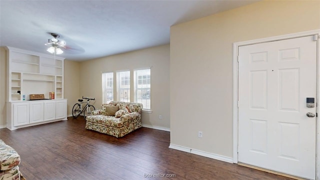 609 Townplace Dr, College Station, TX 77840 - sitting room featuring dark wood-type flooring and baseboards