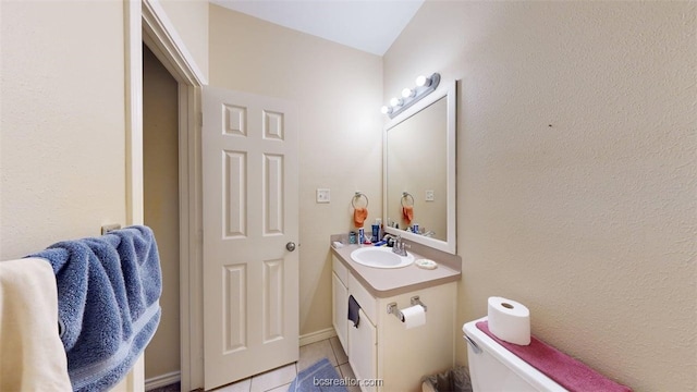 609 Townplace Dr, College Station, TX 77840 - half bath featuring vanity and tile patterned flooring