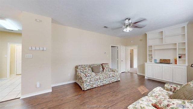 609 Townplace Dr, College Station, TX 77840 - living room with ceiling fan and wood finished floors