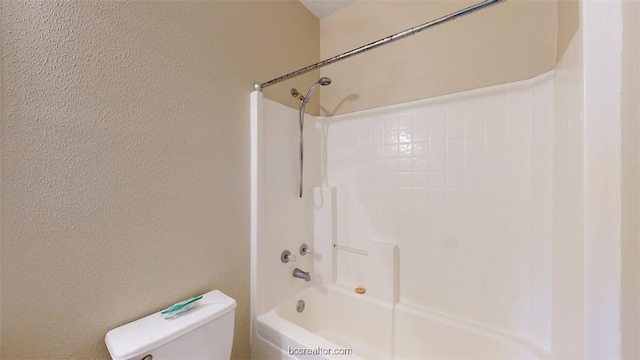 609 Townplace Dr, College Station, TX 77840 - full bathroom featuring a textured wall and shower / tub combination
