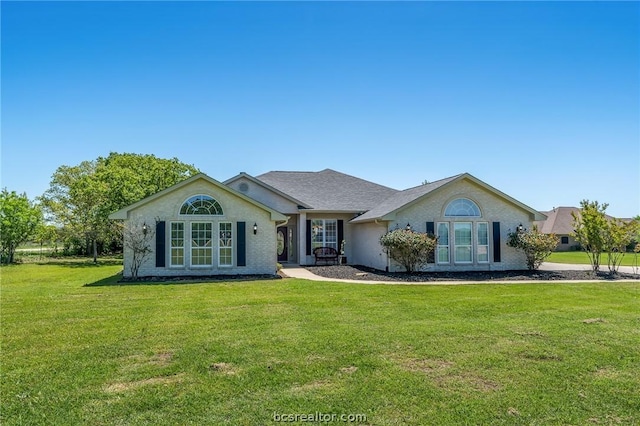 single story home with a front yard