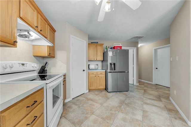 kitchen featuring ceiling fan and appliances with stainless steel finishes