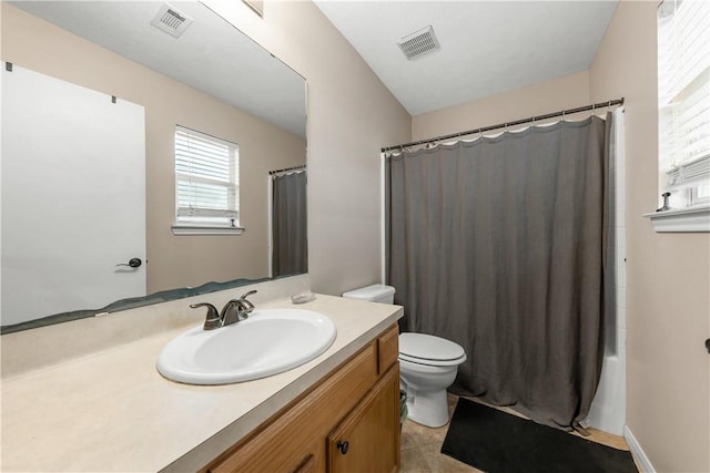 full bathroom featuring vanity, shower / tub combo, tile patterned flooring, and toilet