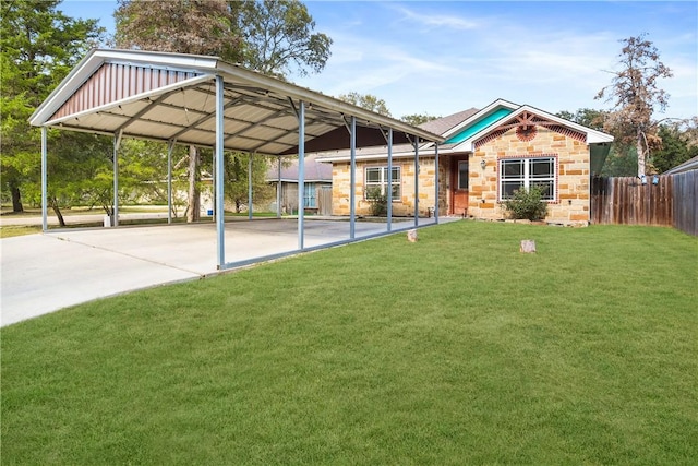 exterior space featuring a yard and a carport