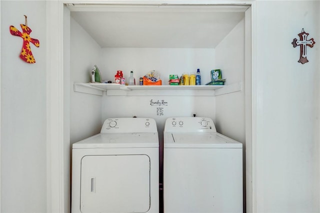 washroom with laundry area and washer and dryer