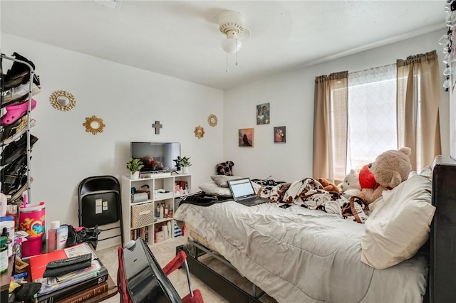 bedroom featuring a ceiling fan and carpet floors