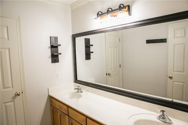 bathroom featuring vanity and ornamental molding